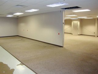 On approximately 1 acre, plenty of paved parking area.  Presently set up for office space and loading dock with overhead door in storage area, 3 Phase, all communication wiring in place and complete sprinkler system and restrooms.  Facility easily converted to manufacturing with high ceilings.  Approximately 5900 sq. ft. of space.

 - Prime Commercial/Industrial Real Estate